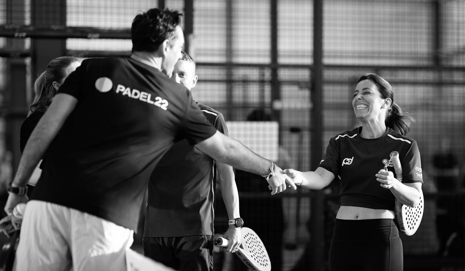 Ben Nichols with padel industry figures courtside